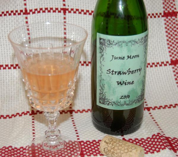 My first attempt at strawberry country wine.  I wish I had waited for the label to dry before taking the picture.