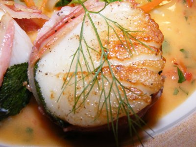 Scallops wrapped in sage and pancetta with herb beurre blanc