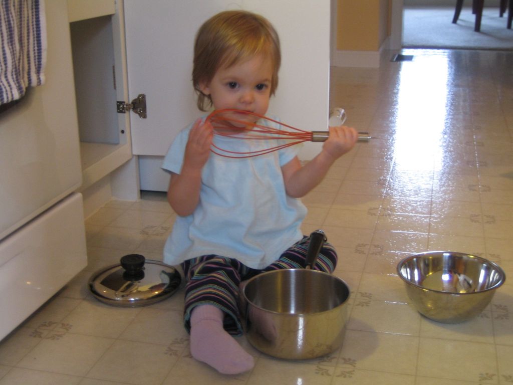 Sofie loves helping--cooking, filling the washing machine and unloading the dishwasher are her current favorites!