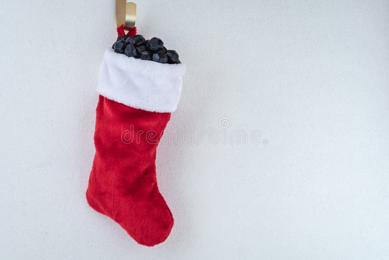traditional-red-white-plush-christmas-stocking-stuffed-coal-shaped-candy-traditional-red-white-plush-christmas-134892561.jpg